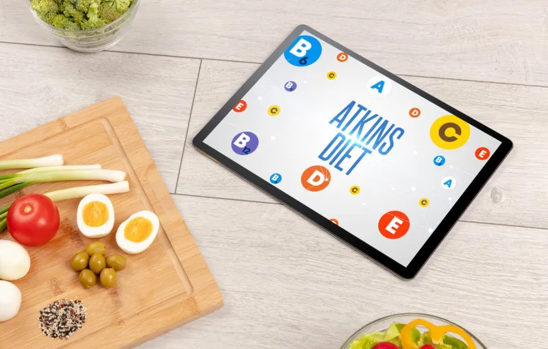 healthy tablet pc compostion with atkins diet inscription, weight loss concept
