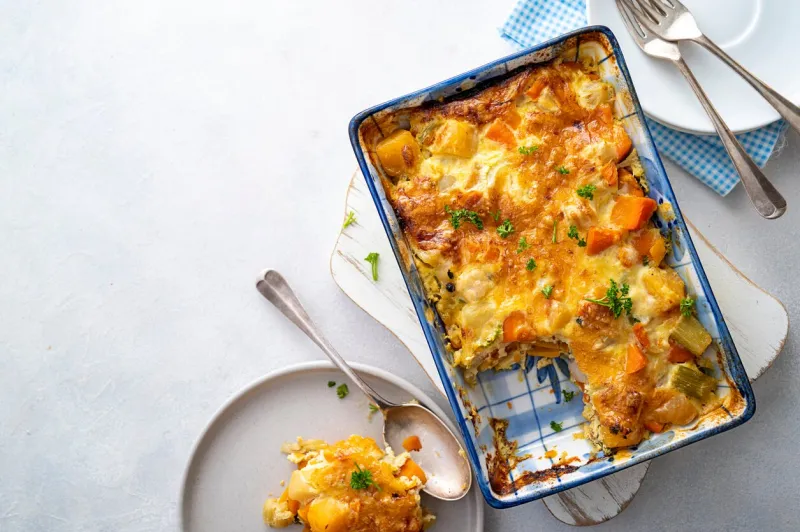 vegetable gratin with sweet potato, celery, parsnip, carrot, cheese and eggs comfort, rustic one casserole foods