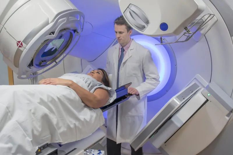 woman receiving radiation therapy treatments for breast cancer