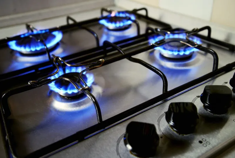 blue flames from gas stove