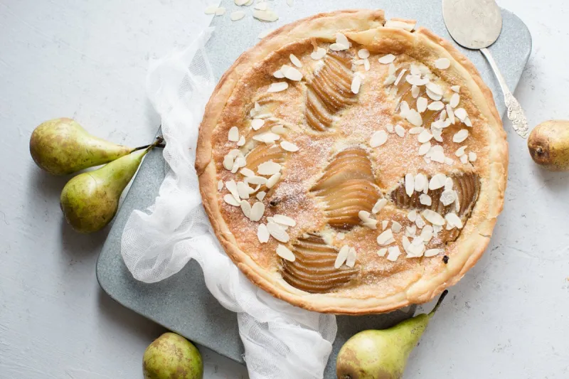 tart with poached pears and almond frangipane