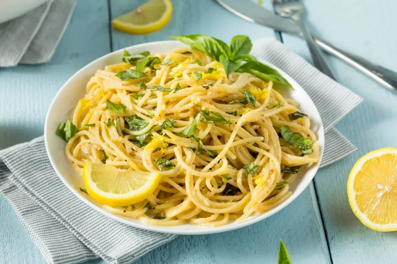 homemade basil lemon spaghetti with parmesan cheese