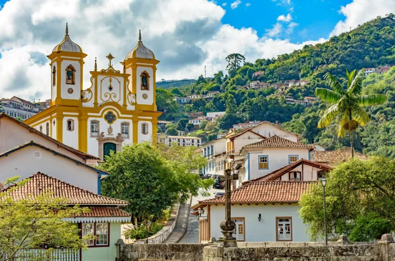 top view of the center of the historic ouro preto city in minas gerais, brazil with its famous churches and old buildings with hills in background