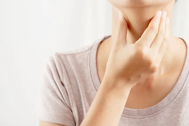 a woman has a cough, cold, sore throat, phlegm