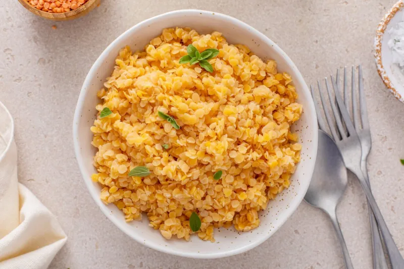 cooked red lentils in a bowl, healthy vegan protein source, meat alternative