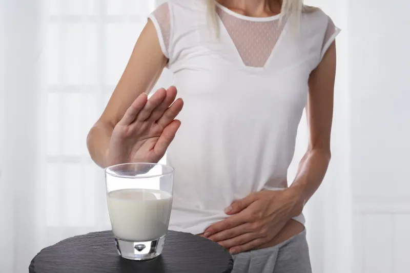 lactose intolerance dairy intolerant woman refuses to drink milk