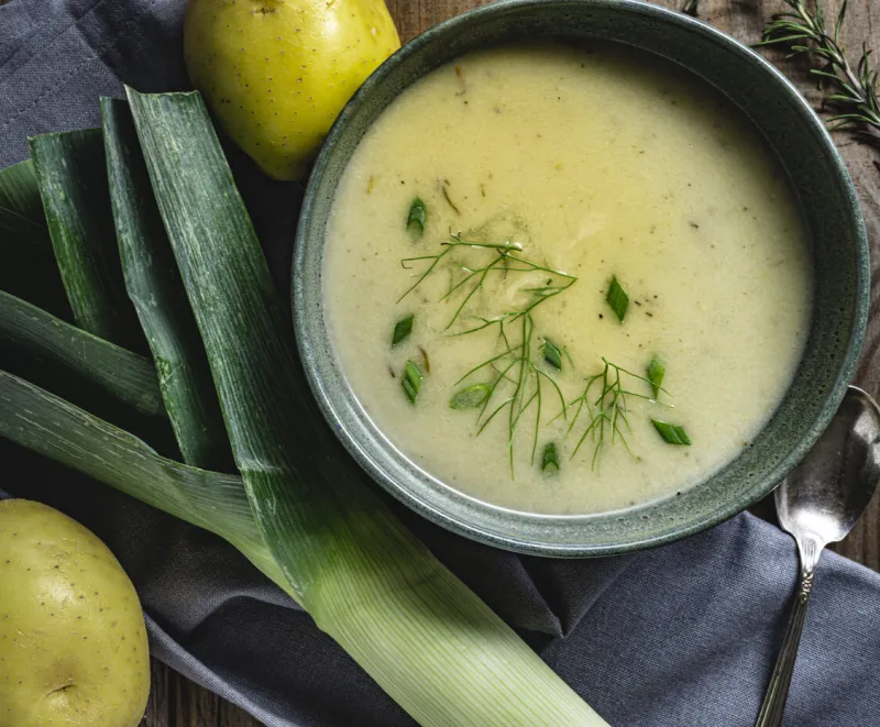 vegan creamy leek and potato soup studio shot, flat lay, above