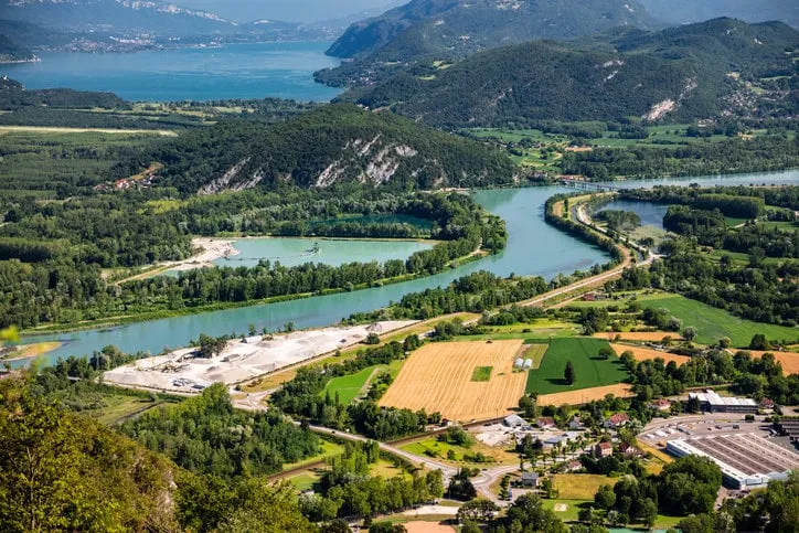 beautiful aerial view french summer landscape viewed from grand colombier summit in middle of bugey mountains in ain department, with rhone river, vibrant green fields and lake bourget in savoie
