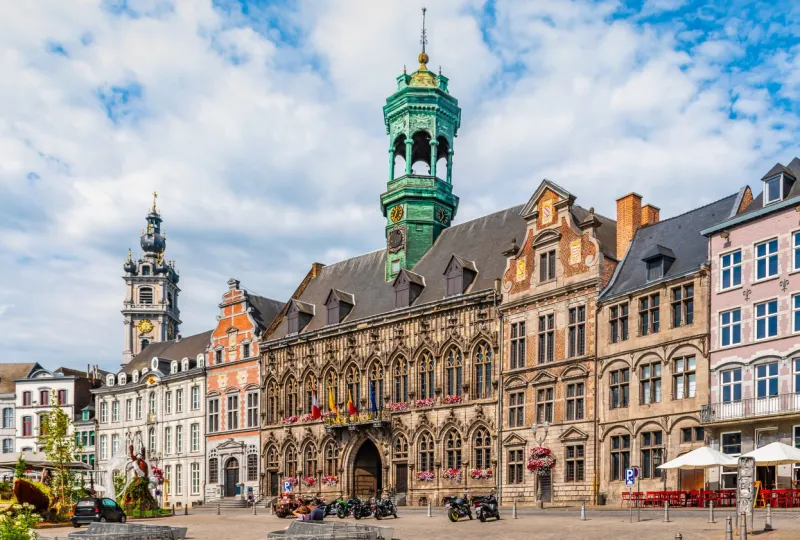 mons, hainaut, wallonia, belgium beautiful architecture on central square with town hall and beautiful historical buildings on a summer day