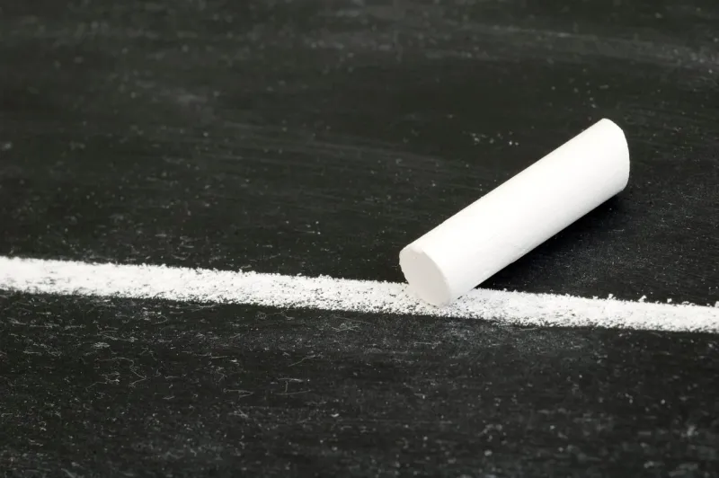 chalk on line on chalkboard