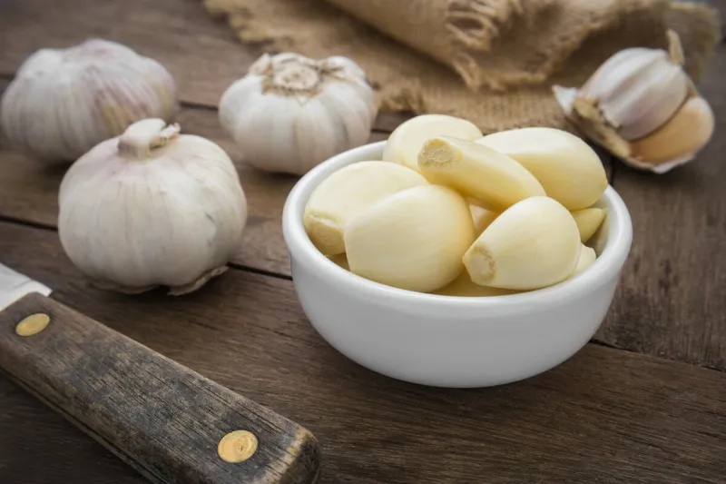 peeled garlic in bowl