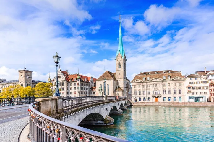 zurich, switzerland view of the historic city center with famous fraumunster church, on the limmat river
