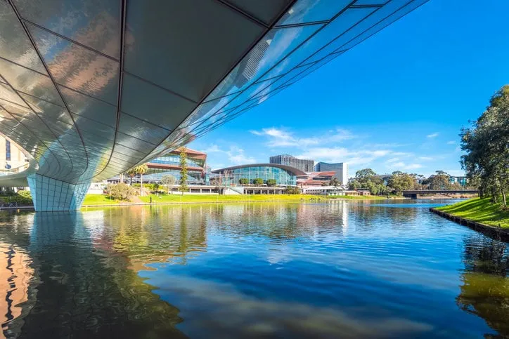 adelaide city riverbank viewed from under the bridge on a bright summer day
