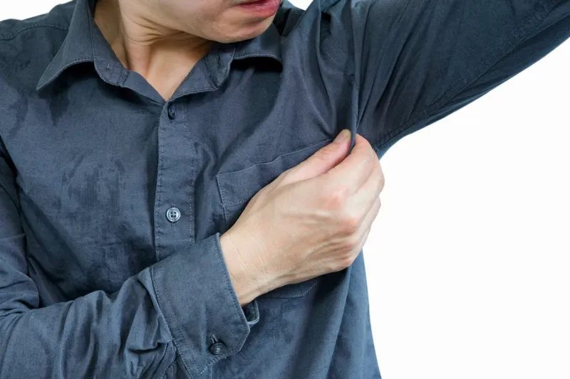 men wear white sleeves, arms are covered with armpits, sweat are unclean and unclean health care concept