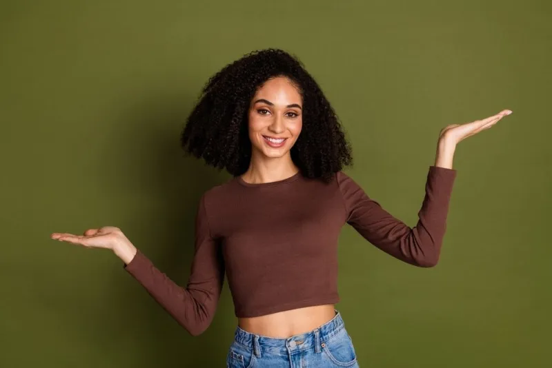 photo,portrait,of,pretty,young,girl,compare,hold,empty,space