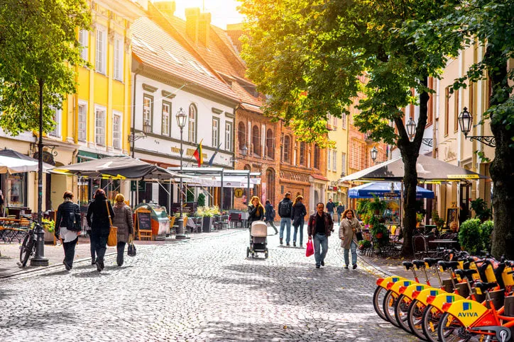 vilnius, lithuania - september 21, 2016  tourists walk on the main pedestrian street with cafes and bars in the old town of vilnius city