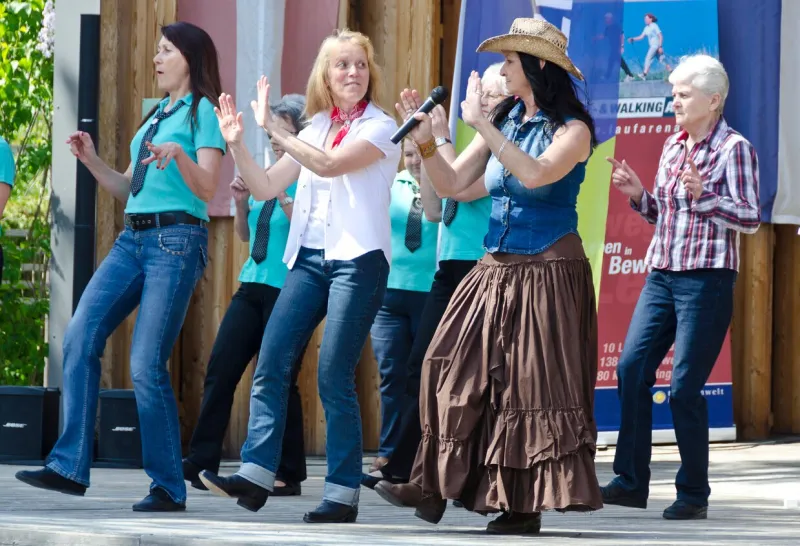 the band texas riders and linedancer at the opening of the cycling and walking season 2014 in bath tatzmannsdorf, burgenland, austria