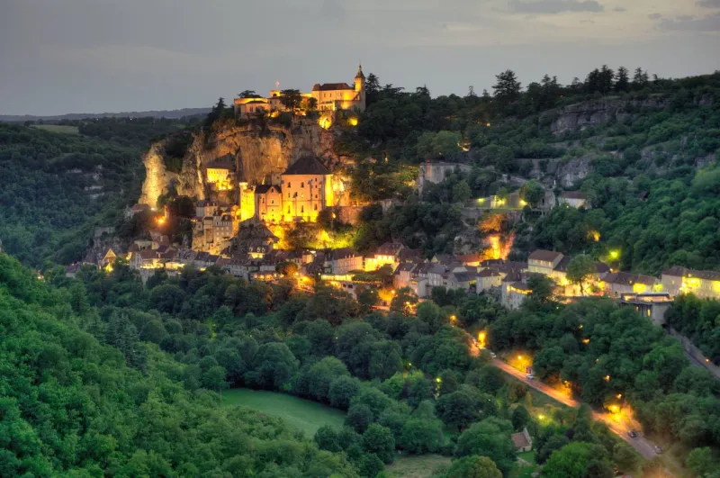 the small and picturesque village of rocamadour in the twilight