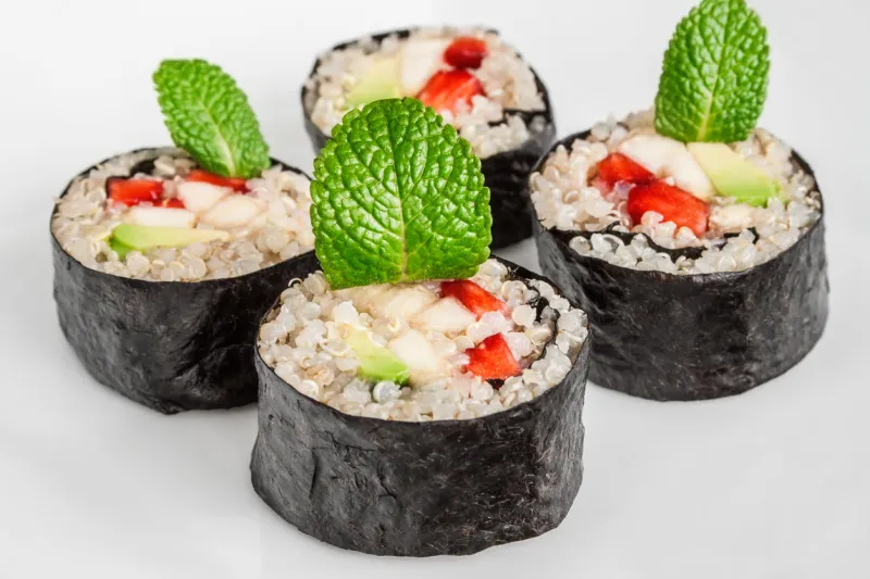 close up image of sweet quinoa sushi rolls with fresh fruits