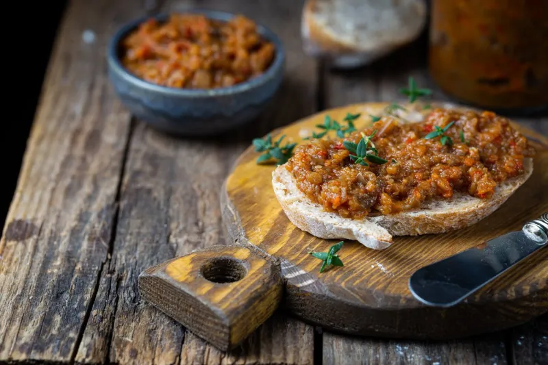eggplant dip with bread sandwich with eggplant caviar on wooden background