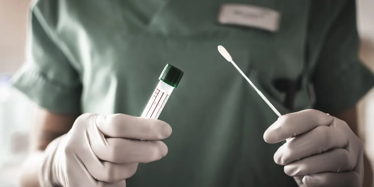 nurse holds a swab for the coronavirus   covid19 test