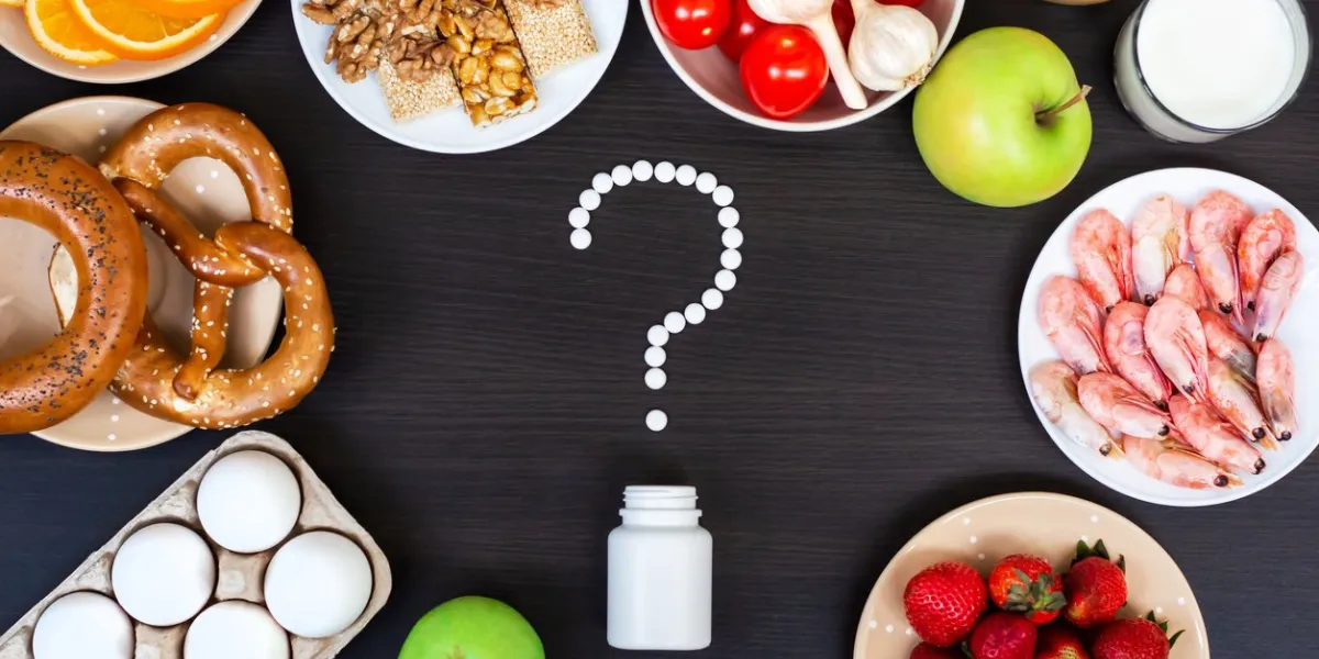 set of food that cause allergy on wooden table