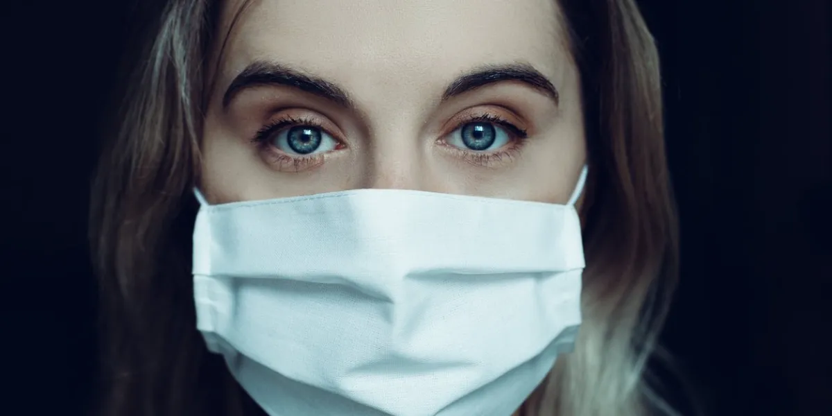 young woman wearing a medical mask
