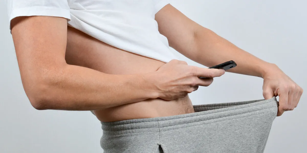 man taking a picture of his penis with a smart-phone a so-called dick pic