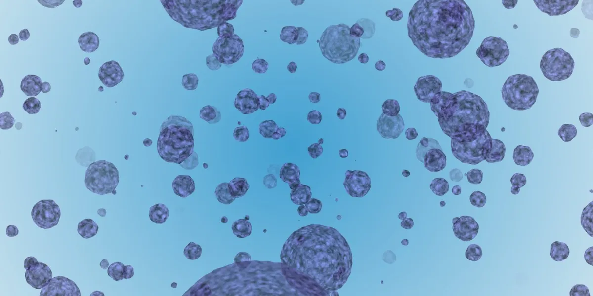 photograph of coronavirus covid-19 in blue, under magnification in a 3d electron microscope virus concept