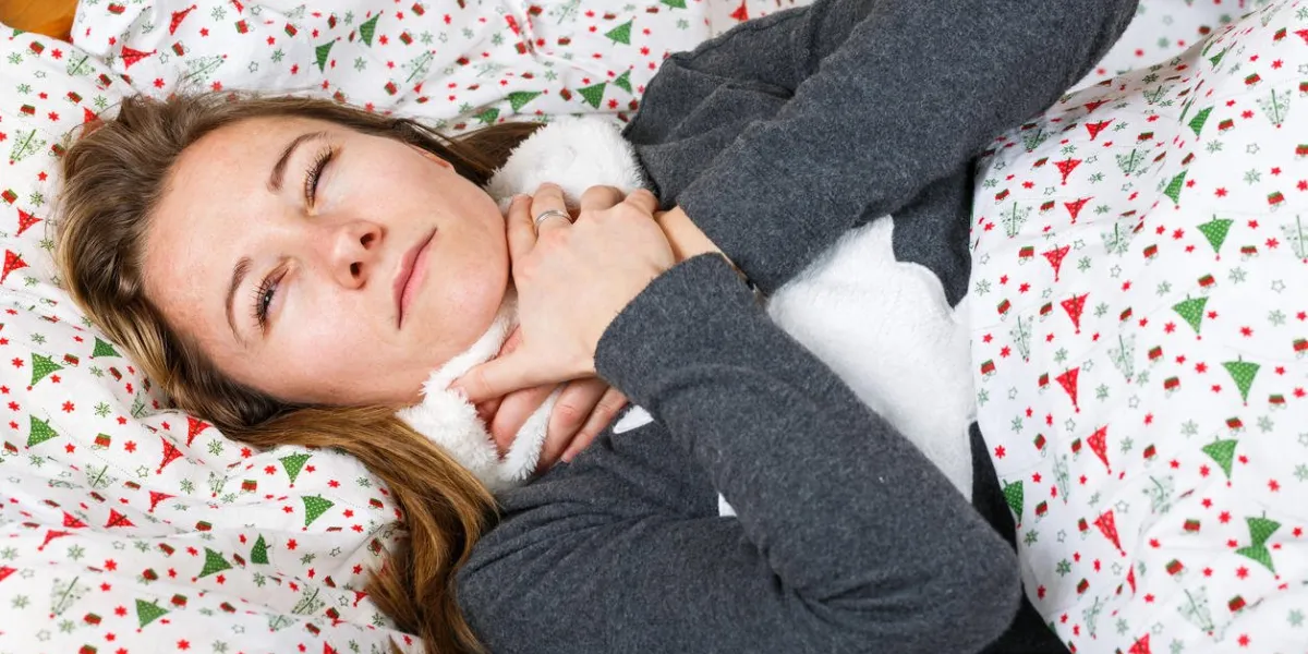sick young woman sleeping in the bed