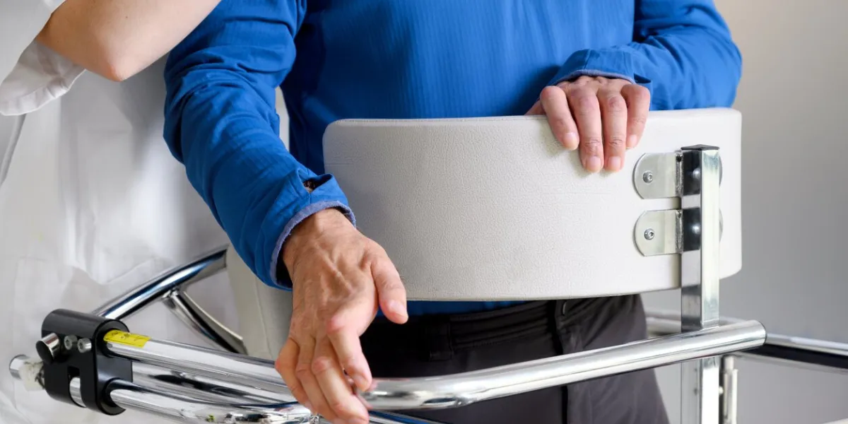 physiotherapist assisting a patient with amyotrophic lateral sclerosis high quality photo