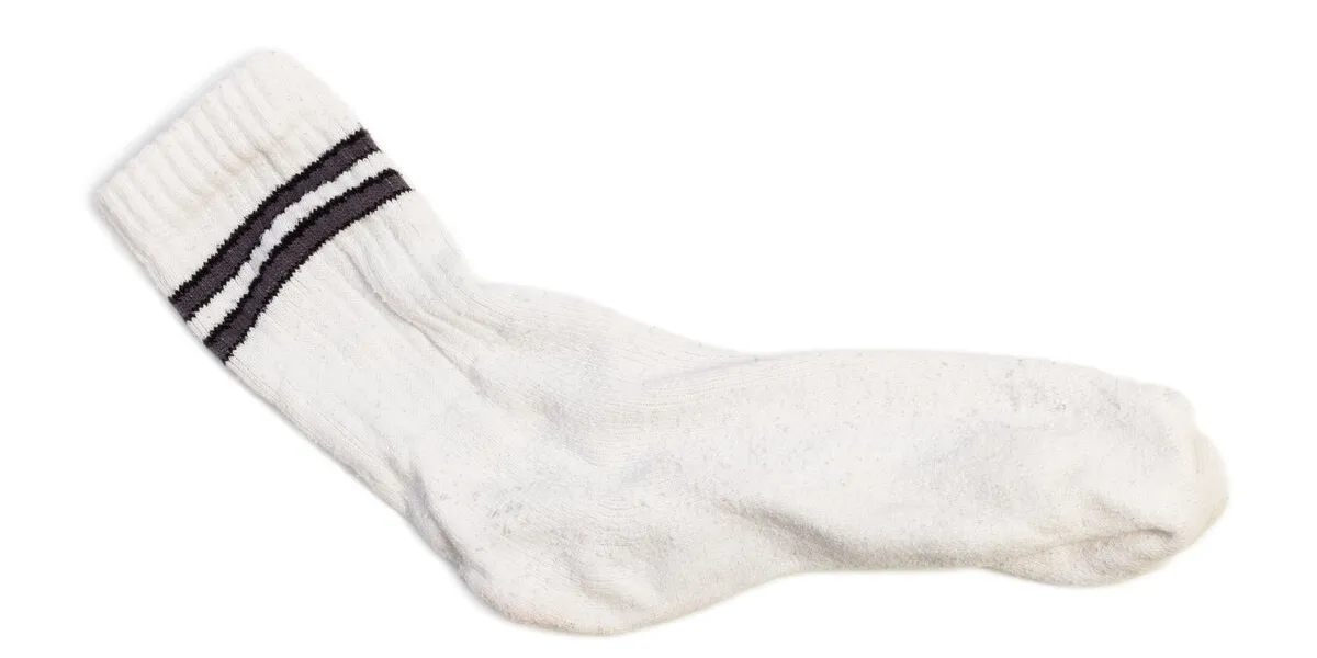 closeup of one clean white tennis sport sock isolated on white