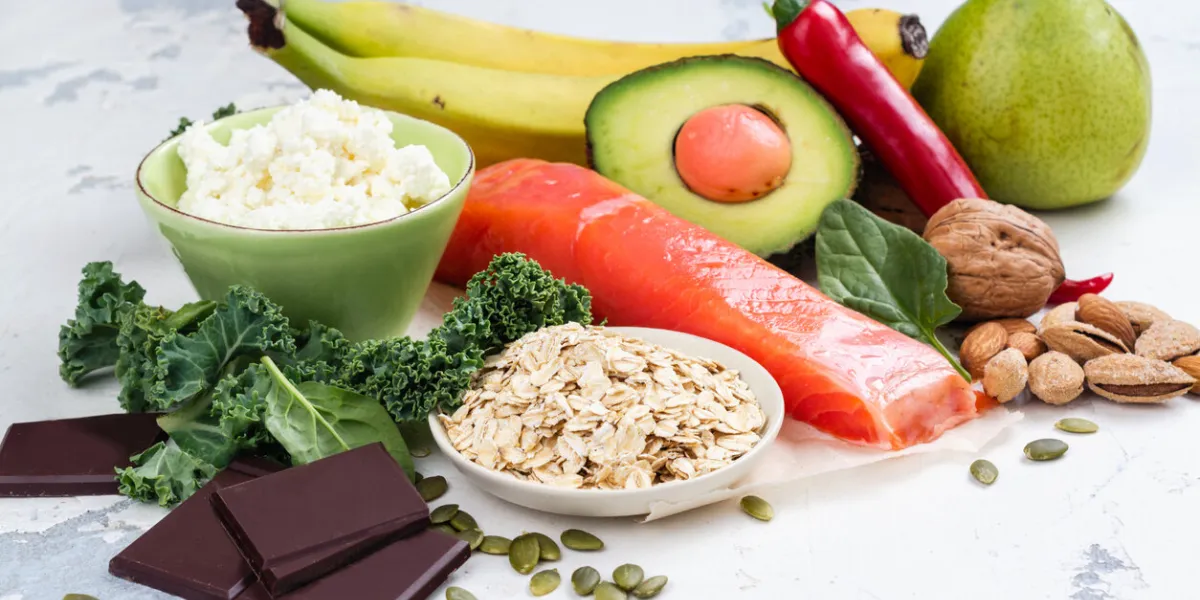 assortment of food - natural sources of dopamine food good for brain on white background copy space
