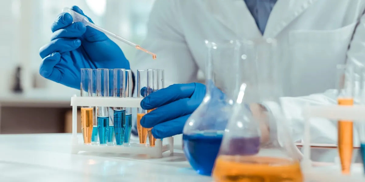 chemical samples close up of test tubes being used by a smart skilled scientist in the chemical lab