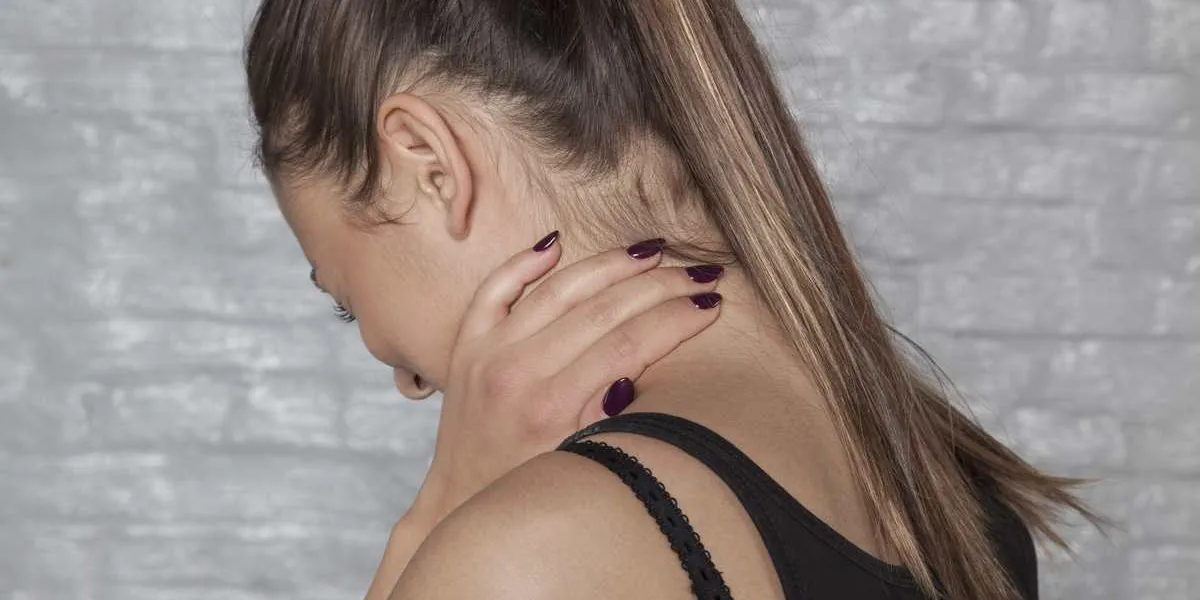 young woman have whiplash pain