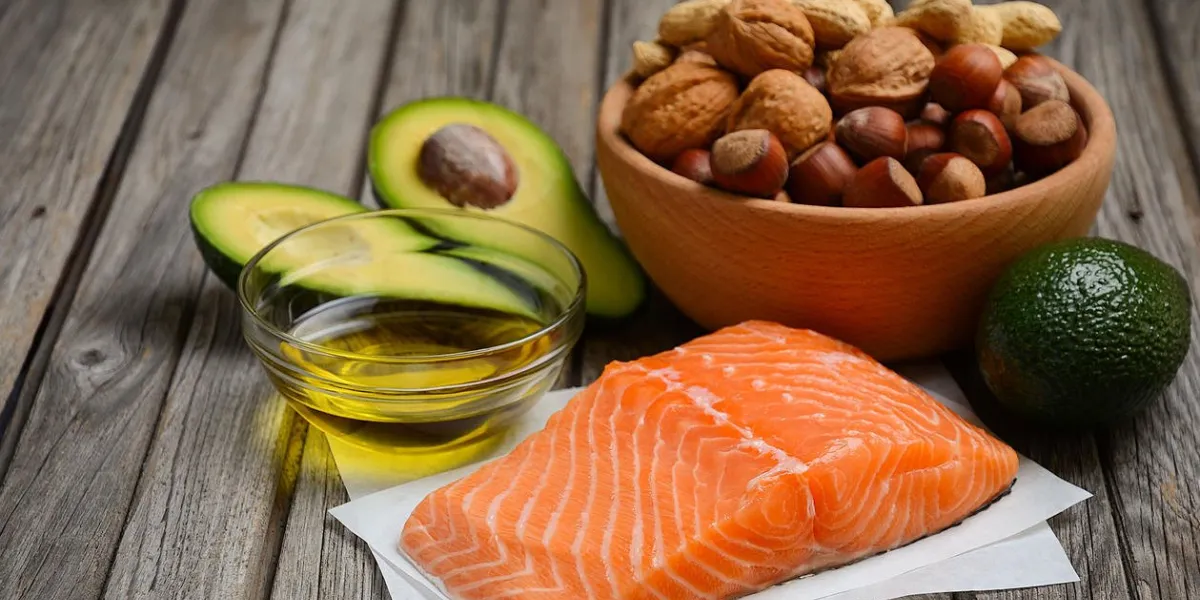 selection of healthy fat sources rustic background