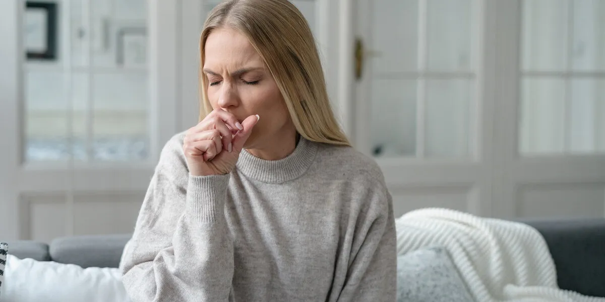 blonde upset woman with disease symptoms, fever and influenza, illness girl alone at home, has bronchitis and feeling weakness