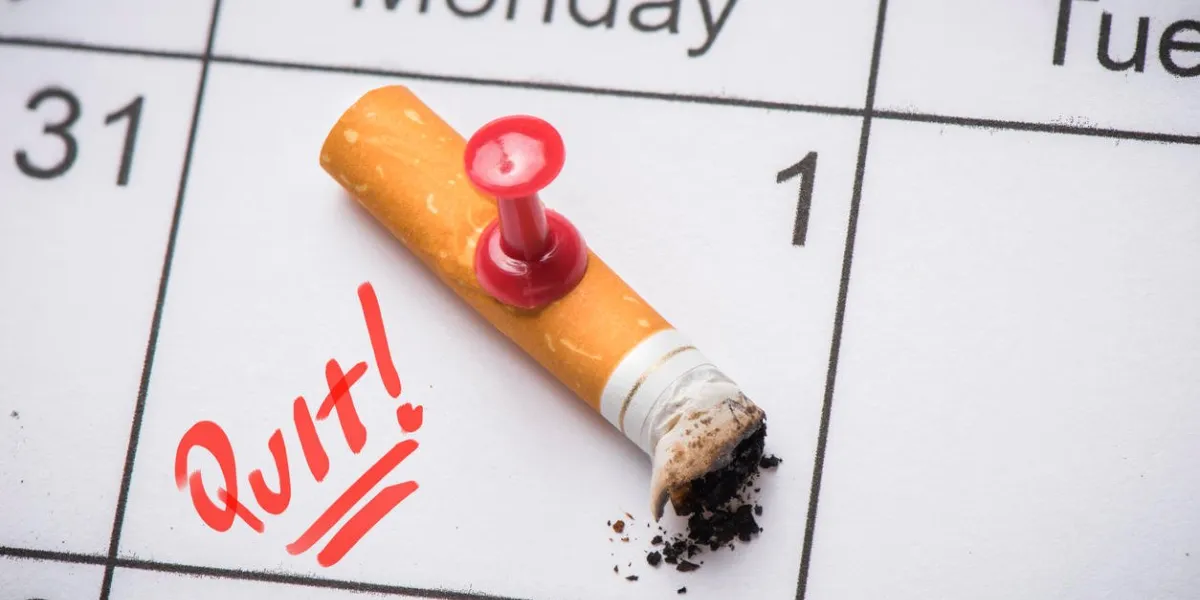 cigarette on calendar time to quit smoking concept