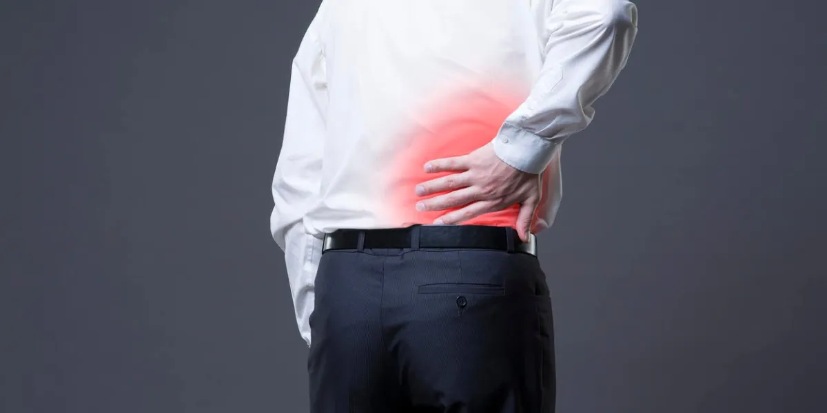 back pain, kidney inflammation, ache in man's body, studio shot with red spots