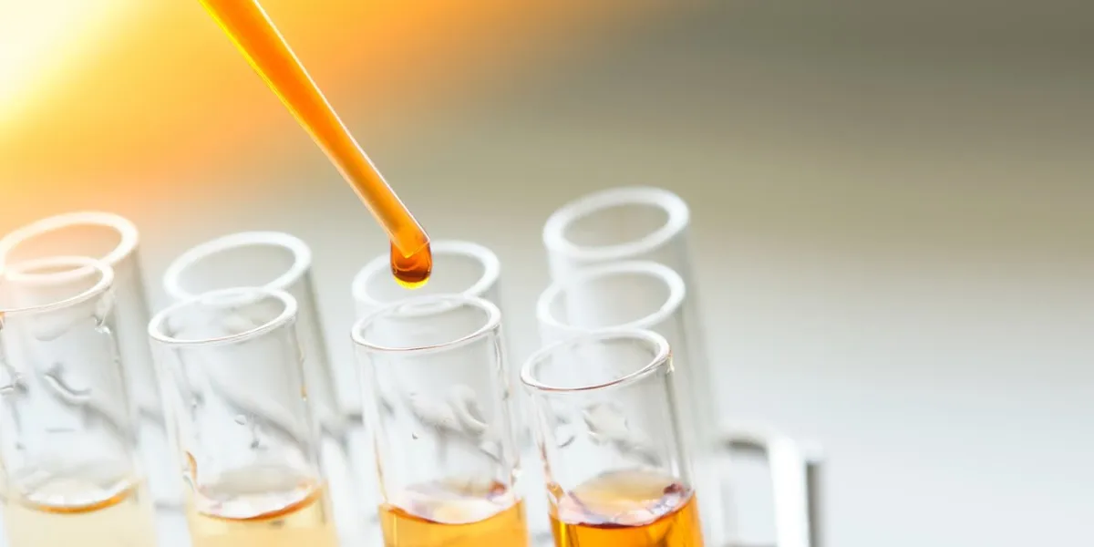 equipment and glassware for test product extraction and orange color solution, in the chemistry laboratory