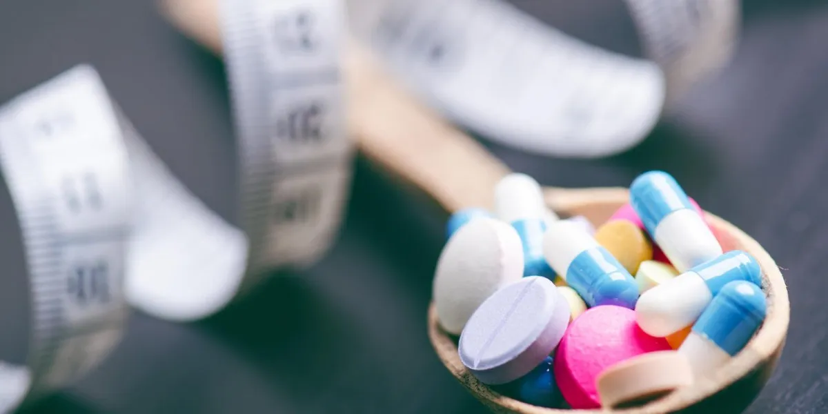 full wooden spoon and pills