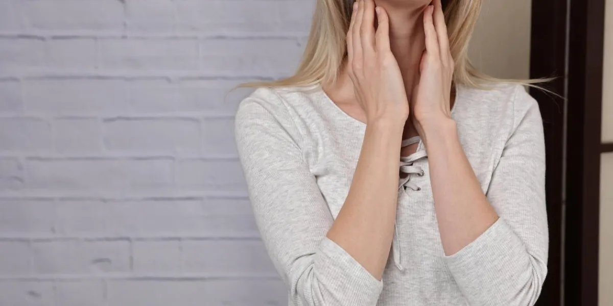 female neck and shoulders close up woman thyroid gland control