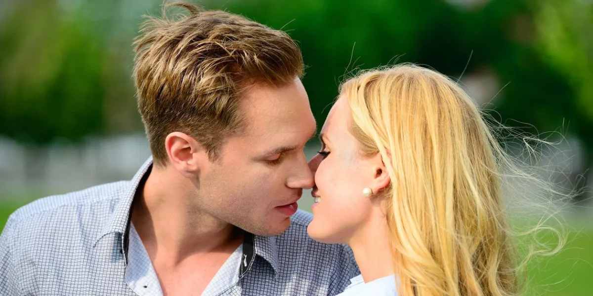 the exciting moment before the first kiss young adults in love close watch the flying hair