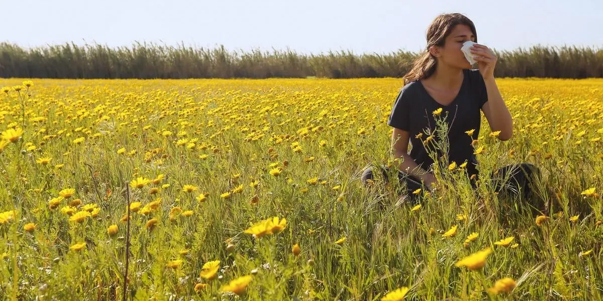 there is young girl in flowery field in cyprus