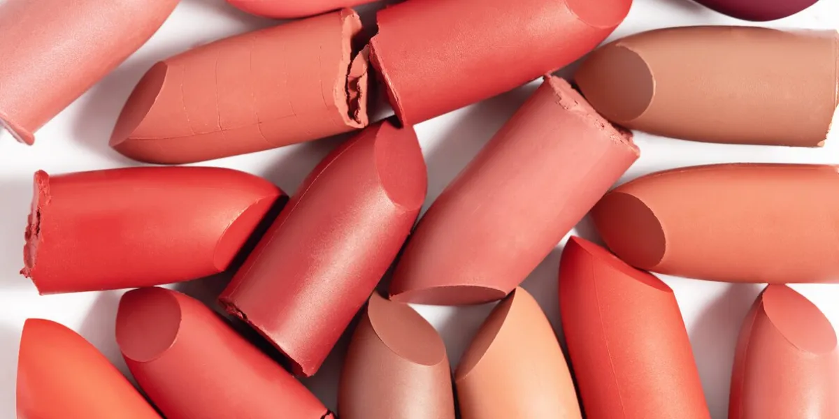 various cut lipsticks on white background makeup product samples