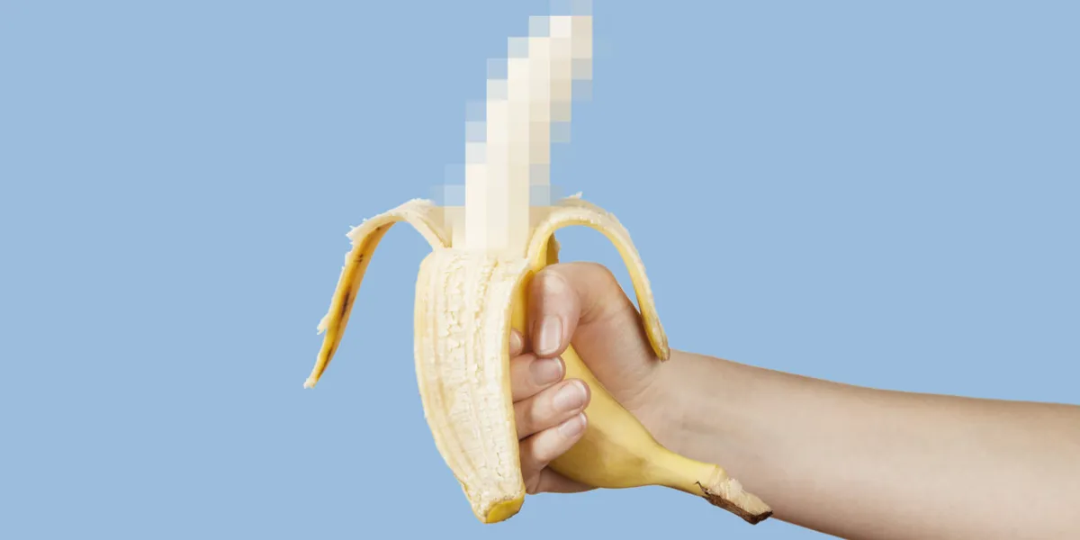 hidden censored banana in hand on a blue background horny (aroused) penis, male erection and sexual education funny pornography