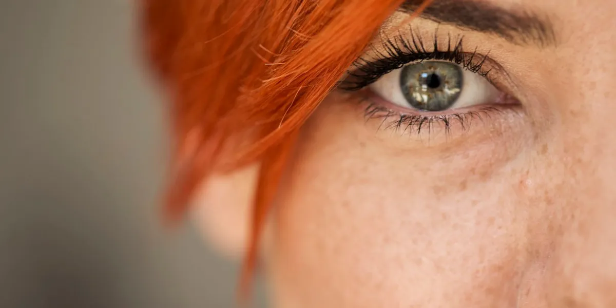 close up shot of woman eye looking at camera