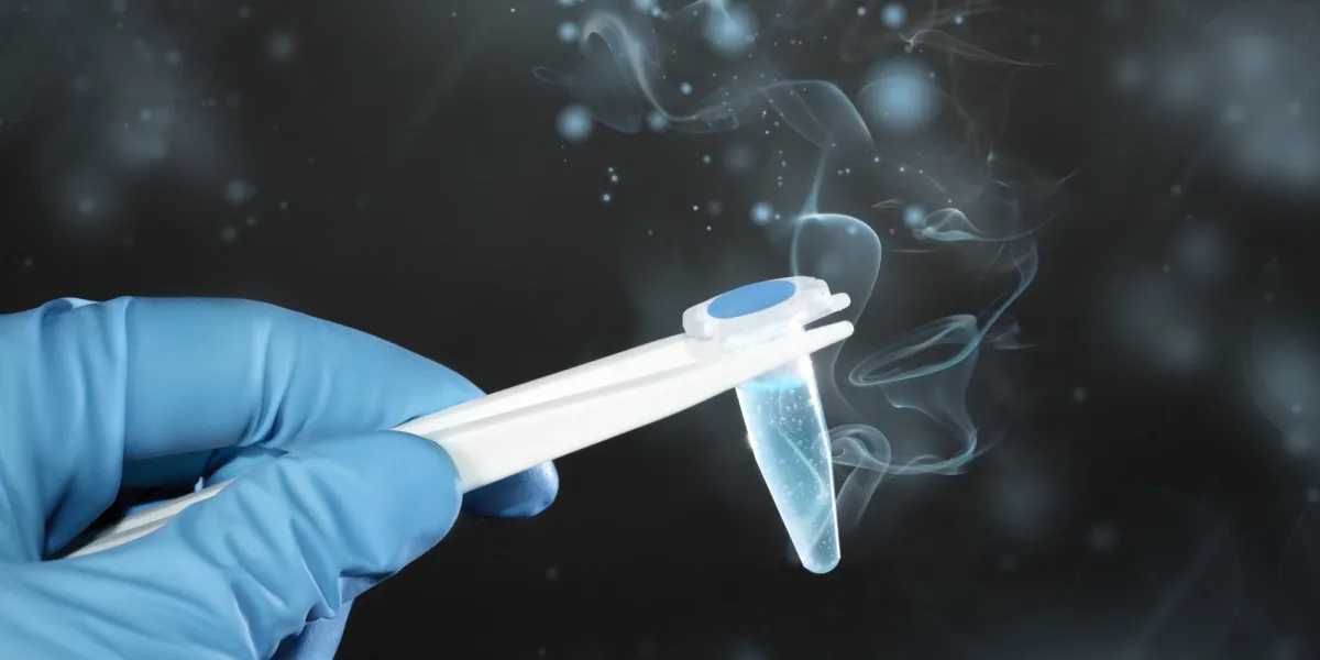 thawing cryosample taken out of cryostorage on dark green background, text space