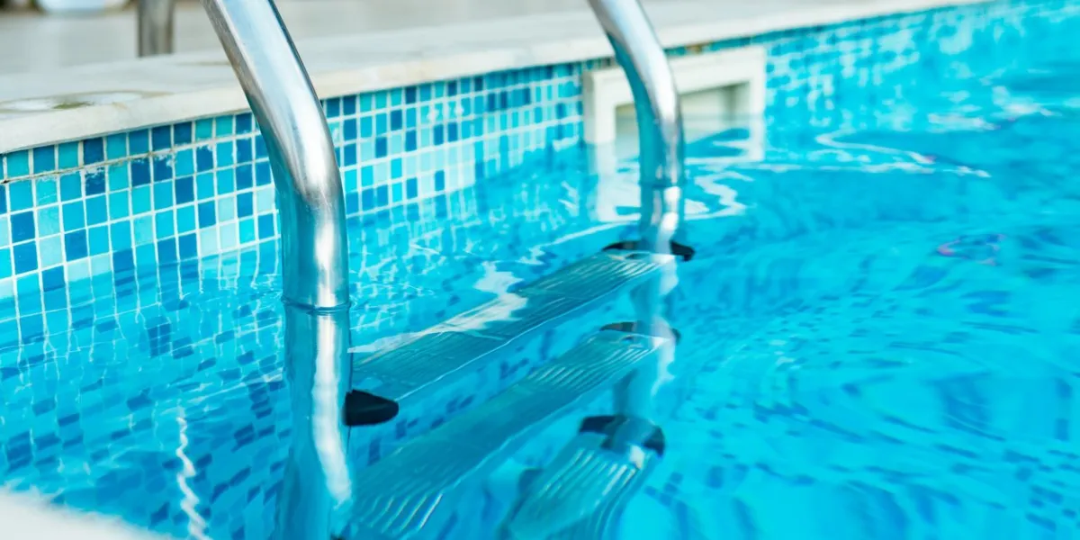 swimming pool with stair at luxury hotel