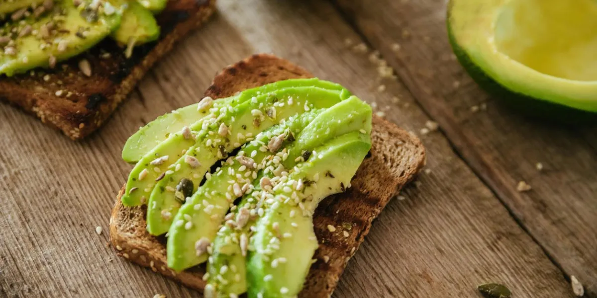 avocado toast on a wooden cutting board